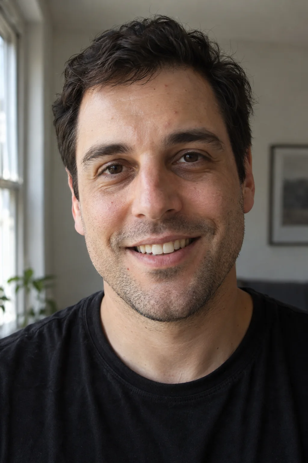Smiling man in a naturally lit portrait